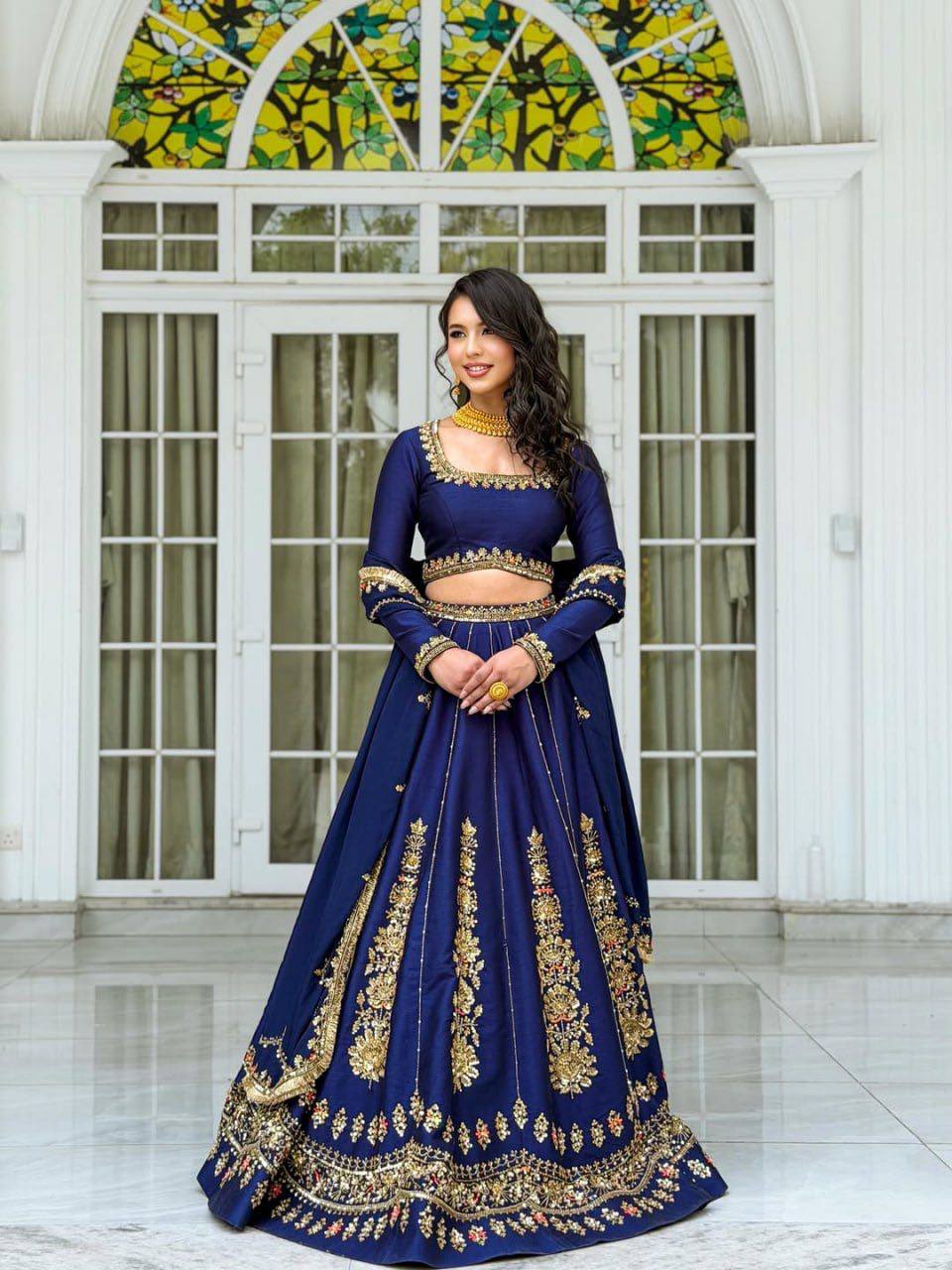Radiant Rani Pink Silk Lehenga Choli Adorned with Opulent Heritage Floral Motifs and Intricate Zari Borders